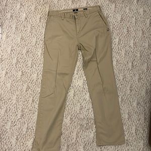 DC beige pants, size 32, gently worn.
